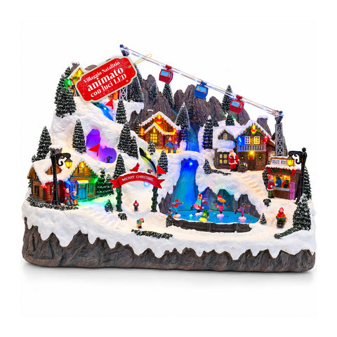 Illuminated Christmas Village with Moving Ski and Skating Rinks, LED Lights and Music – 56x37x42 cm