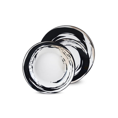 Elegant Vulcania 18-Piece Black/White Dinnerware Set for Refined Dinners