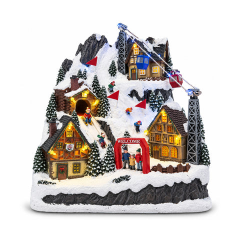 Illuminated Christmas Village with Moving Slide, Cable Car, LED Lights and Christmas Music – 28x19x32 cm